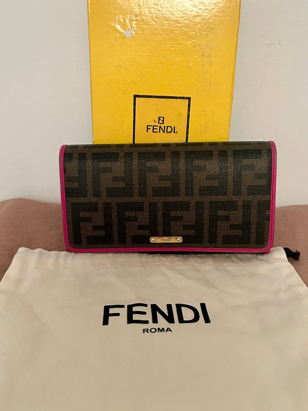 Fendi Tobacco/Pink Zucca Coated Canvas Flap Continental
Wallet. ECU